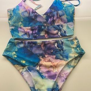 Never Worn 2piece Swim Suit Multi Print, pad inserts in bra.